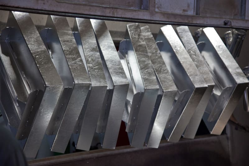 Rack plating of larger metal machine pieces